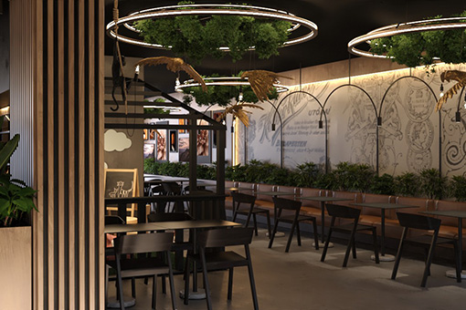 Modern interior space with plants and wooden columns in a restaurant or café.