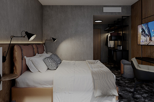 Superior room with a comfortable double bed, modern lamps, and elegant wall design.