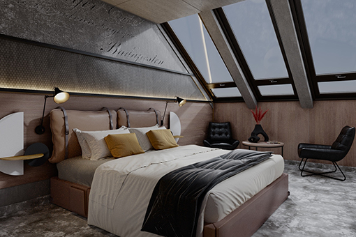 Executive room with slanted skylight windows, double bed, armchair, and modern furnishings.
